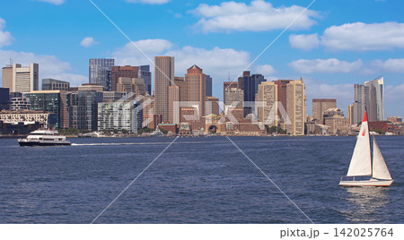 Boston skyline with sailing boat on the foreground, USA Boston skyline with sailing boat on the foreground, USA 142025764