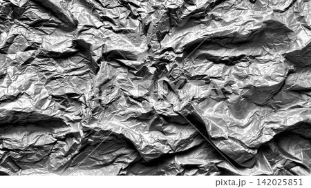 crumpled aluminum foil texture reflecting dramatic silver light as abstract backdrop in packaging and web design crumpled aluminum foil texture reflecting dramatic silver light as abstract backdrop in packaging and web design 142025851