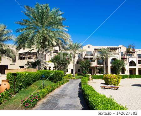FUJAIRAH, UAE - November 16: Low-rise Arabian (Moroccan) style architecture of 5 stars Iberotel Miramar Al Aqah Beach Resort (321 rooms) located on Indian Ocean shores, Fujairah, UAE, on November 16 FUJAIRAH, UAE - November 16: Low-rise Arabian (Moroccan) style architecture of 5 stars Iberotel Miramar Al Aqah Beach Resort (321 rooms) located on Indian Ocean shores, Fujairah, UAE, on November 16 142027582