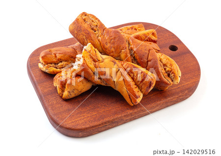 twisted Chocolate Flavor Milk Bread Sticks on Tray twisted Chocolate Flavor Milk Bread Sticks on Tray 142029516