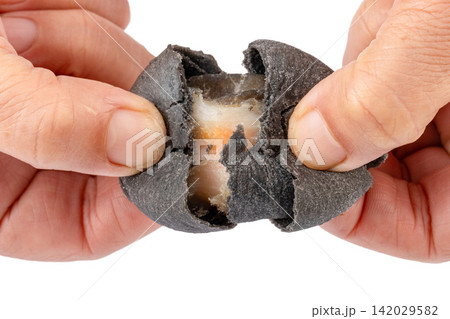 black Charcoal Salted Egg Yolk Pastry Sliced black Charcoal Salted Egg Yolk Pastry Sliced 142029582