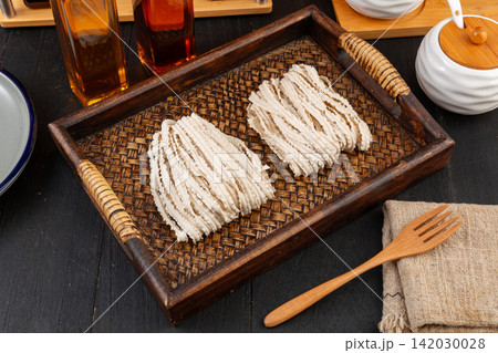 dried knife sliced noodle block traditional Asian wheat pasta dried knife sliced noodle block traditional Asian wheat pasta 142030028