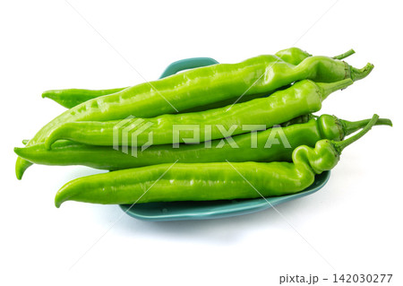 fresh Green Chili Pepper Vegetable Ingredient Close Up fresh Green Chili Pepper Vegetable Ingredient Close Up 142030277