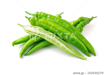 fresh Green Chili Pepper Vegetable Ingredient Close Up fresh Green Chili Pepper Vegetable Ingredient Close Up 142030279