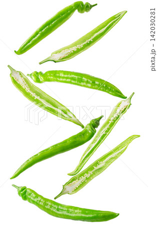 fresh Green Chili Pepper Vegetable Ingredient Close Up fresh Green Chili Pepper Vegetable Ingredient Close Up 142030281