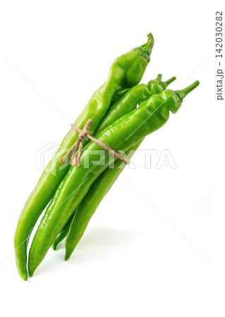 fresh Green Chili Pepper Vegetable Ingredient Close Up fresh Green Chili Pepper Vegetable Ingredient Close Up 142030282