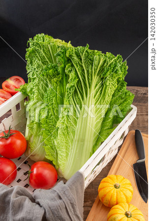 fresh Napa Cabbage Green Leaf Vegetable Ingredient Close Up fresh Napa Cabbage Green Leaf Vegetable Ingredient Close Up 142030350