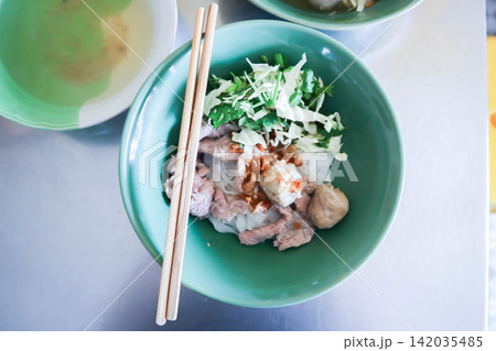dry noodles or plain noodles, Chinese noodle with meatball and beef or noodles without soup 142035485