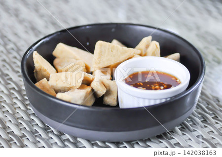 fried tofu with dip or bean cake, bean curd 142038163