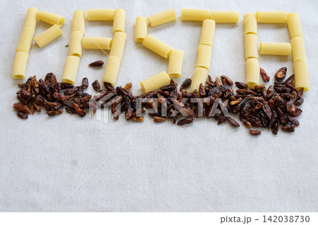 Pasta word made with dry rigatoni Pasta word made with dry rigatoni 142038730