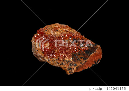 Macro mineral stone Vanadinite on a black background Macro mineral stone Vanadinite on a black background 142041136