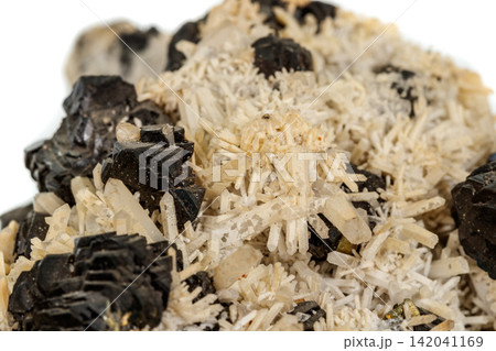 Macro stone mineral Pyrrhotite, quartz, Sphalerite, calcite, Galena on white background Macro stone mineral Pyrrhotite, quartz, Sphalerite, calcite, Galena on white background 142041169