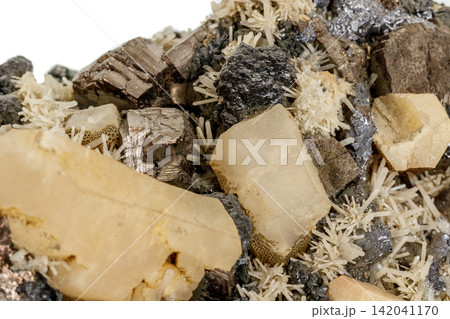 Macro stone mineral Pyrrhotite, quartz, Sphalerite, calcite, Galena on white background Macro stone mineral Pyrrhotite, quartz, Sphalerite, calcite, Galena on white background 142041170