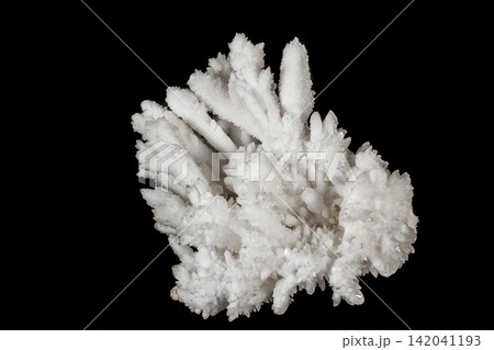 Macro stone Calcite mineral on a black background 142041193