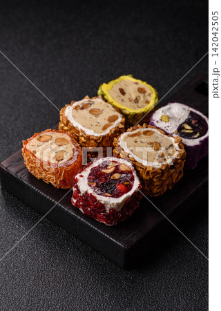 Turkish delight or lokum is a traditional Eastern sweet made with nuts. Turkish delight, lokum Turkish delight or lokum is a traditional Eastern sweet made with nuts. Turkish delight, lokum 142042505