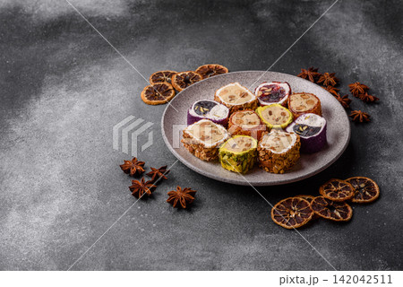 Turkish delight or lokum is a traditional Eastern sweet made with nuts. Turkish delight, lokum Turkish delight or lokum is a traditional Eastern sweet made with nuts. Turkish delight, lokum 142042511
