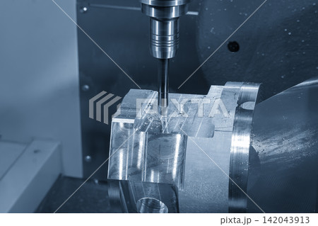 Bore cutting process on aluminum part using indexable tool on 5 axis CNC milling machine in blue tone 142043913