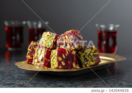 Traditional Turkish delights and black tea. 142044838