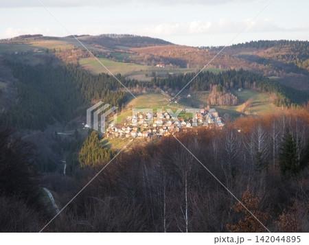 Zlatibor, Serbia, a natural rural landscape. View of the mountains with a spruce forest in spring in April. Ethno tourism in the Balkans. Balkan Range, Zlatar. Suburb of Nova Varosh, National Park. Zlatibor, Serbia, a natural rural landscape. View of the mountains with a spruce forest in spring in April. Ethno tourism in the Balkans. Balkan Range, Zlatar. Suburb of Nova Varosh, National Park. 142044895