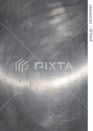 Brushed Stainless Steel Texture Background with Scratches and Reflections Brushed Stainless Steel Texture Background with Scratches and Reflections 142044997