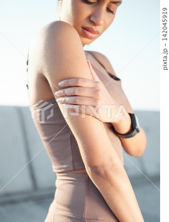 Girl, outdoor and runner with shoulder pain in workout, training injury or fitness cardio running accident. Woman, hurt arm muscle or closeup of injured athlete in exercise emergency or sore body Girl, outdoor and runner with shoulder pain in workout, training injury or fitness cardio running accident. Woman, hurt arm muscle or closeup of injured athlete in exercise emergency or sore body 142045919