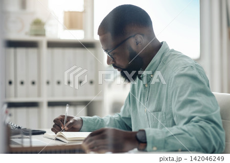 Businessman, schedule and writing in office for planning of administration, agenda and meeting calendar with glasses. Professional, employee and notebook by desk for strategy ideas and journal report Businessman, schedule and writing in office for planning of administration, agenda and meeting calendar with glasses. Professional, employee and notebook by desk for strategy ideas and journal report 142046249