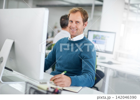 Professional, portrait and business man in office with computer for project planning, research or searching web. Analyst, desktop and employee at desk for concentration, taking notes or information Professional, portrait and business man in office with computer for project planning, research or searching web. Analyst, desktop and employee at desk for concentration, taking notes or information 142046390