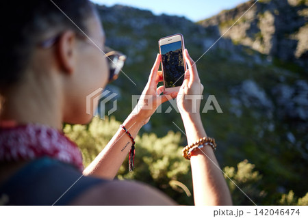 Hiking, hands and phone screen for mountain photography, nature or environment outdoor in Sweden. Mobile, display and person take picture in forest for adventure, holiday or travel on summer vacation Hiking, hands and phone screen for mountain photography, nature or environment outdoor in Sweden. Mobile, display and person take picture in forest for adventure, holiday or travel on summer vacation 142046474