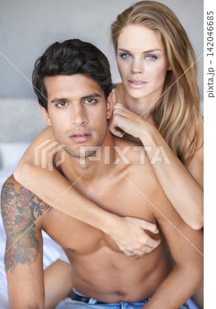 Couple, hug and portrait in bedroom on morning, love and romance bonding in home for relationship. People, embrace and security in marriage connection, care and rest in hotel on vacation or holiday Couple, hug and portrait in bedroom on morning, love and romance bonding in home for relationship. People, embrace and security in marriage connection, care and rest in hotel on vacation or holiday 142046685