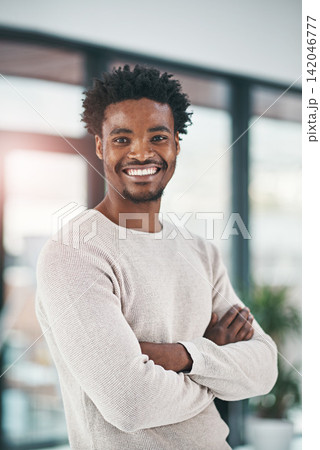 Black man, portrait and business with confidence of creative in career ambition or job opportunity at office. African, male person or employee designer with smile or arms crossed for pride in startup Black man, portrait and business with confidence of creative in career ambition or job opportunity at office. African, male person or employee designer with smile or arms crossed for pride in startup 142046777