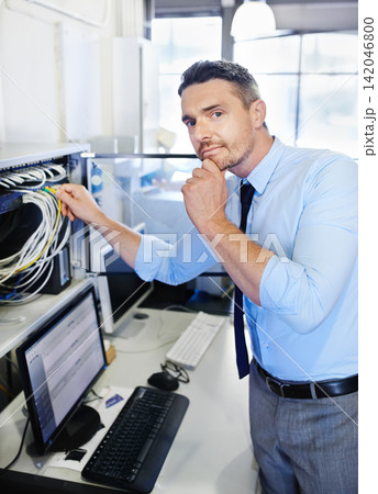 Portrait, man or technician thinking of hardware cables for computer glitch, backup or office cords. Ideas, programmer or engineer fixing wires for information technology, engineering or IT support 142046800
