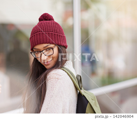 Girl, student and smile with backpack at university or campus for education, teaching and learning. Portrait, teen and happy with glasses at college with break from school work, study and revision Girl, student and smile with backpack at university or campus for education, teaching and learning. Portrait, teen and happy with glasses at college with break from school work, study and revision 142046904