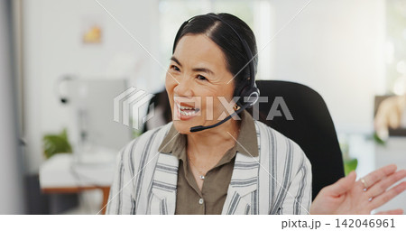 Asian woman, call center and documents in virtual meeting, discussion or customer service at the office. Friendly female person, consultant or agent talking and hello for online webinar at workplace 142046961