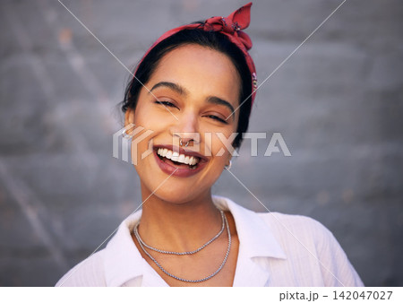 Woman, portrait and smile with wall background in city with jewellery accessories, gen z or downtown. Female person, face and laughing for funny joke or urban traveling in Mexico, piercing or fashion Woman, portrait and smile with wall background in city with jewellery accessories, gen z or downtown. Female person, face and laughing for funny joke or urban traveling in Mexico, piercing or fashion 142047027