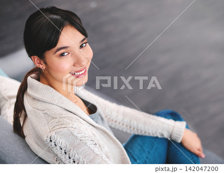 Woman, smile or portrait on couch in home for comfort, summer break and relaxing on weekend. Female person, happy and sitting on sofa with peace or confidence resting for wellness and leisure Woman, smile or portrait on couch in home for comfort, summer break and relaxing on weekend. Female person, happy and sitting on sofa with peace or confidence resting for wellness and leisure 142047200
