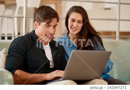 Couple, planning and chat with laptop in home with ideas for property, development or real estate. Mortgage, loan and people talk about marriage finance, budget or research rent application online Couple, planning and chat with laptop in home with ideas for property, development or real estate. Mortgage, loan and people talk about marriage finance, budget or research rent application online 142047271