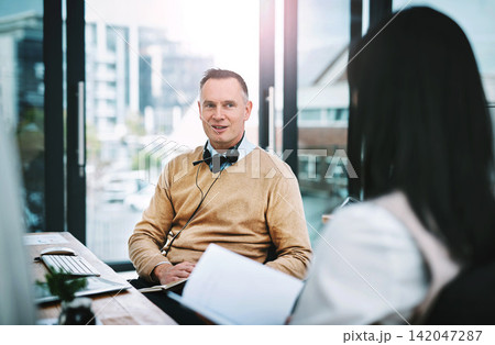 Call centre, office and talking with mentor for coaching on job, communication and learning from manager. Man, woman and speaking for training with notebook at workplace, support for new employee Call centre, office and talking with mentor for coaching on job, communication and learning from manager. Man, woman and speaking for training with notebook at workplace, support for new employee 142047287