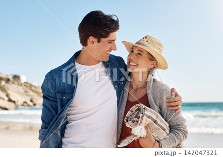Couple, love and support at beach for vacation, summer and smile for anniversary in nature. Man, woman and happiness outdoor for travel, trust and sunshine by ocean for bonding, island and holiday Couple, love and support at beach for vacation, summer and smile for anniversary in nature. Man, woman and happiness outdoor for travel, trust and sunshine by ocean for bonding, island and holiday 142047321