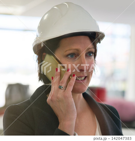 Phone call, helmet and woman in site for construction, affirmative action and inspector visit in building. Contractor, female employee and inspection of property, development and report for company Phone call, helmet and woman in site for construction, affirmative action and inspector visit in building. Contractor, female employee and inspection of property, development and report for company 142047383