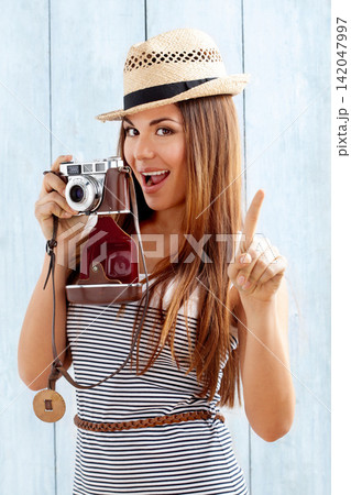 Happy, portrait and woman photographer for photography on holiday travel in Australia for adventure and sightseeing. Female tourist, camera and shooting photos or pictures with gesture for one chance Happy, portrait and woman photographer for photography on holiday travel in Australia for adventure and sightseeing. Female tourist, camera and shooting photos or pictures with gesture for one chance 142047997
