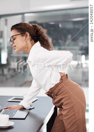 Business woman, back pain and stress in office for accident, tired and massage for muscle injury at desk. Person, emergency and strain on spine with thinking, fatigue and burnout with worry at job Business woman, back pain and stress in office for accident, tired and massage for muscle injury at desk. Person, emergency and strain on spine with thinking, fatigue and burnout with worry at job 142048057
