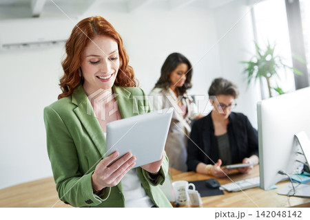 Business, woman and smile with tablet in office for creative research, schedule check and planning. Entrepreneur, employee and reading online article for project, communication and web search at desk 142048142