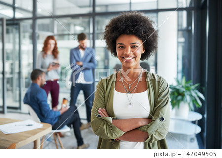 Girl, smiling and excited in office portrait for new opportunity, internship or employment. Young lady, happy and colleagues meeting in background for collaboration, teamwork and partnership Girl, smiling and excited in office portrait for new opportunity, internship or employment. Young lady, happy and colleagues meeting in background for collaboration, teamwork and partnership 142049505