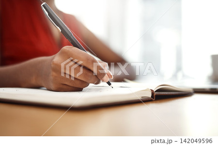 Hand, writing and notes in planner with schedule for university, class or ideas for research. Person, planning and reminder in calendar with deadline info or creative solution to college project Hand, writing and notes in planner with schedule for university, class or ideas for research. Person, planning and reminder in calendar with deadline info or creative solution to college project 142049596