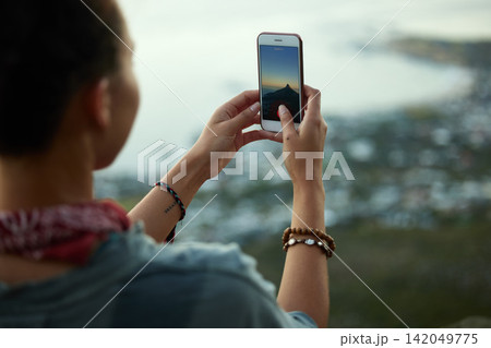 Woman, smartphone and picture on mountain for social media, sunset and adventure for holiday. Influencer, mobile and travel on cliff for cityscape, relax and female person in nature for vacation Woman, smartphone and picture on mountain for social media, sunset and adventure for holiday. Influencer, mobile and travel on cliff for cityscape, relax and female person in nature for vacation 142049775