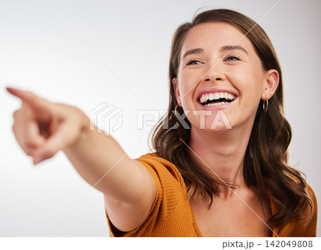 Happy, woman and hand pointing in studio for news, announcement or deal information on white background. Smile, direction and model show service review, feedback and offer, promotion and results Happy, woman and hand pointing in studio for news, announcement or deal information on white background. Smile, direction and model show service review, feedback and offer, promotion and results 142049808