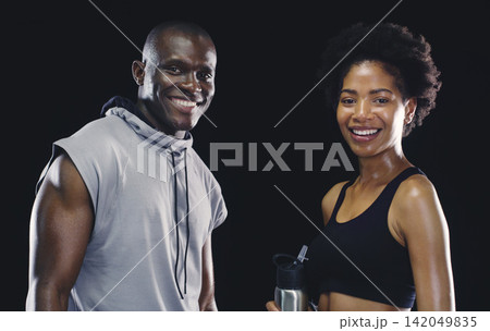 Black people, portrait and sports athlete with personal trainer or sweating, dark background or coaching. Man, woman and face or training together for healthy confidence or gym, studio or teamwork 142049835