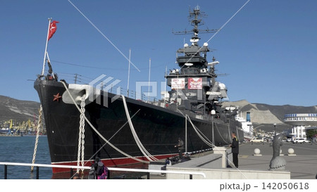 Novorossiysk Russia June 23 2026 Cruiser Mikhail Kutuzov museum ship moored at the sea port passenger terminal on a sunny day Novorossiysk Russia June 23 2026 Cruiser Mikhail Kutuzov museum ship moored at the sea port passenger terminal on a sunny day 142050618