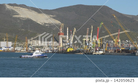 Novorossiysk Russia June 28 2026 Rescue vessel tug HCC 1002 sailing in the commercial seaport of Novorossiysk on a sunny day 142050625