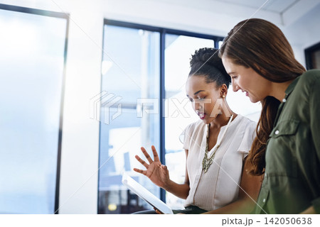 Business, teamwork and women with tablet in office for support, collaboration or consulting for help or advice. Solution, research and digital marketing team with app or creative, idea or inspiration 142050638